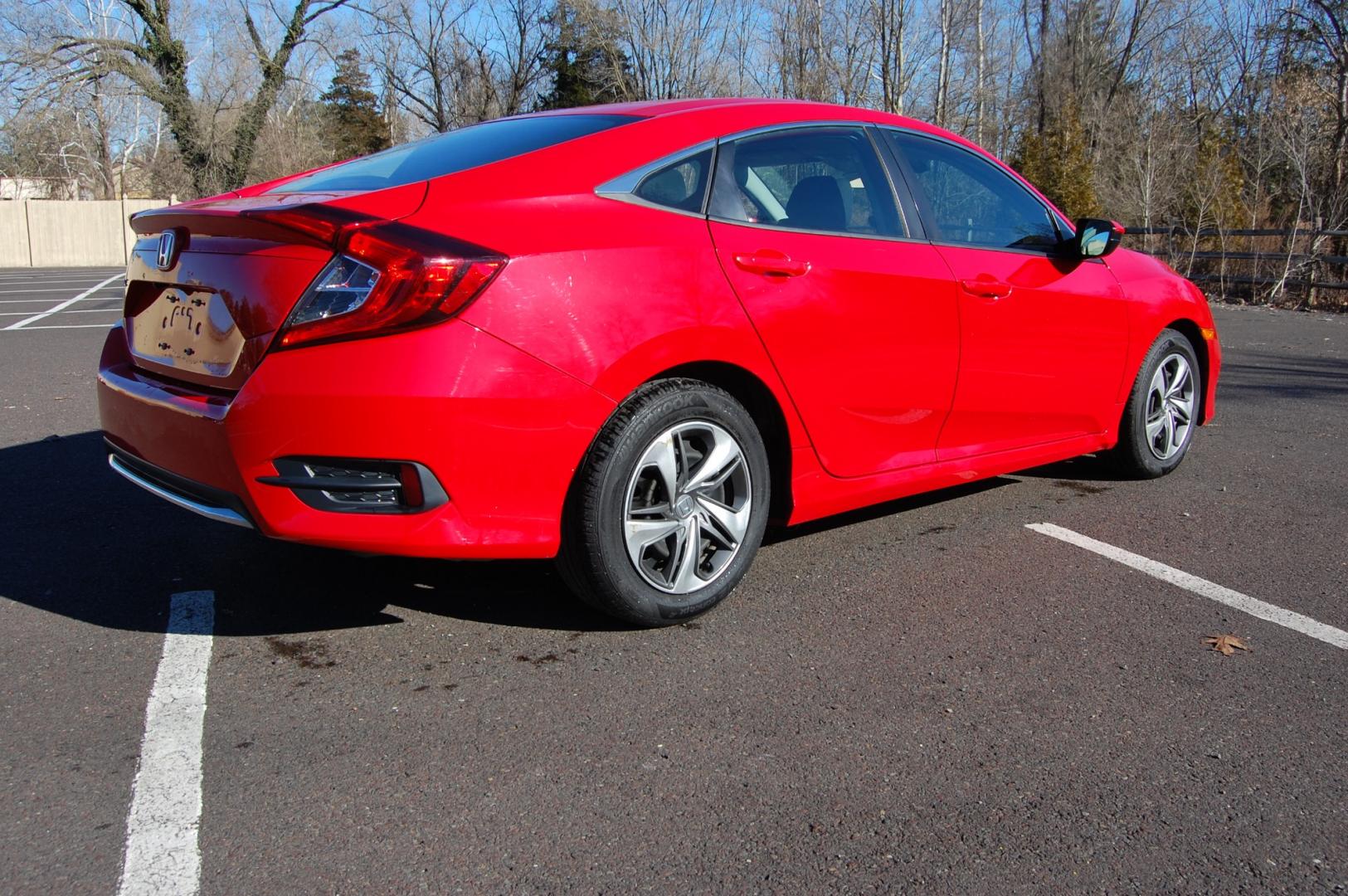 2019 RED /Black Cloth Honda Civic (2HGFC2F60KH) with an 2.0 Liter engine, Automatic transmission, located at 6528 Lower York Road, New Hope, PA, 18938, (215) 862-9555, 40.358707, -74.977882 - One family owned 2019 Honda Civic LX sedan powered by a 2.0 Liter 4 cylinder engine, front wheel drive, automatic transmission. Tilt wheel, cruise control, Dual front and side air bags, Side curtains airbags, ABS braking, AM/FM/Bluetooth/USB, Auto climate control, power windows, locks and mirrors, 1 - Photo#4